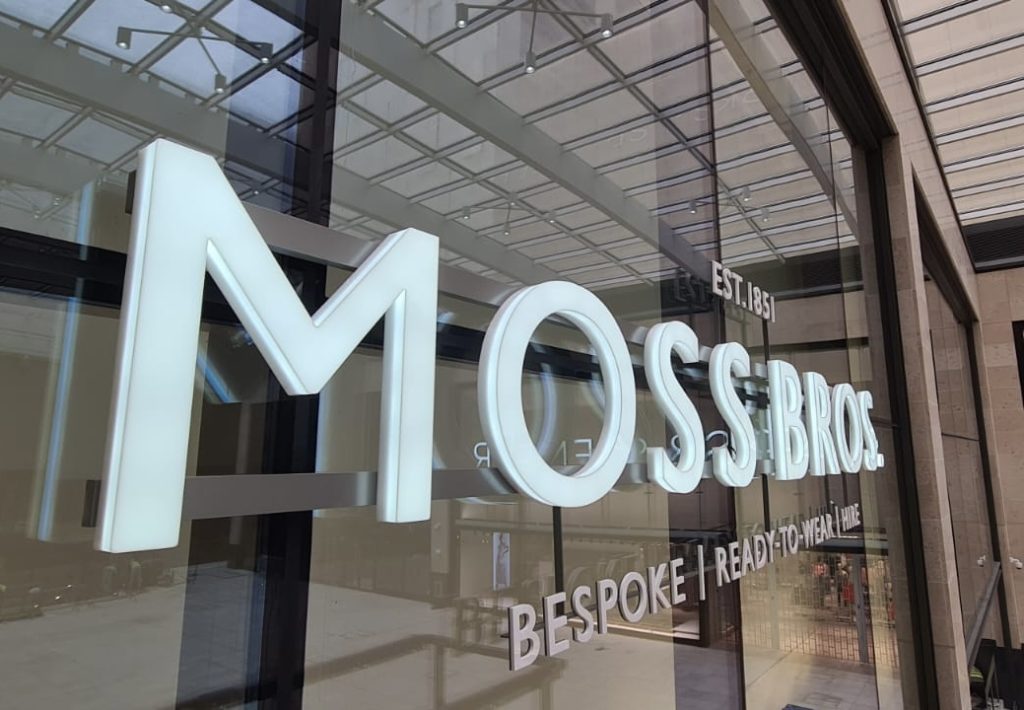 Retail signage ideas - Moss Bros face illuminated external sign