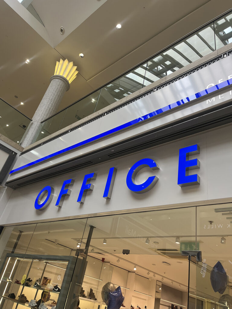 built up letters with acrylic faces and stainless steel returns for office shoes